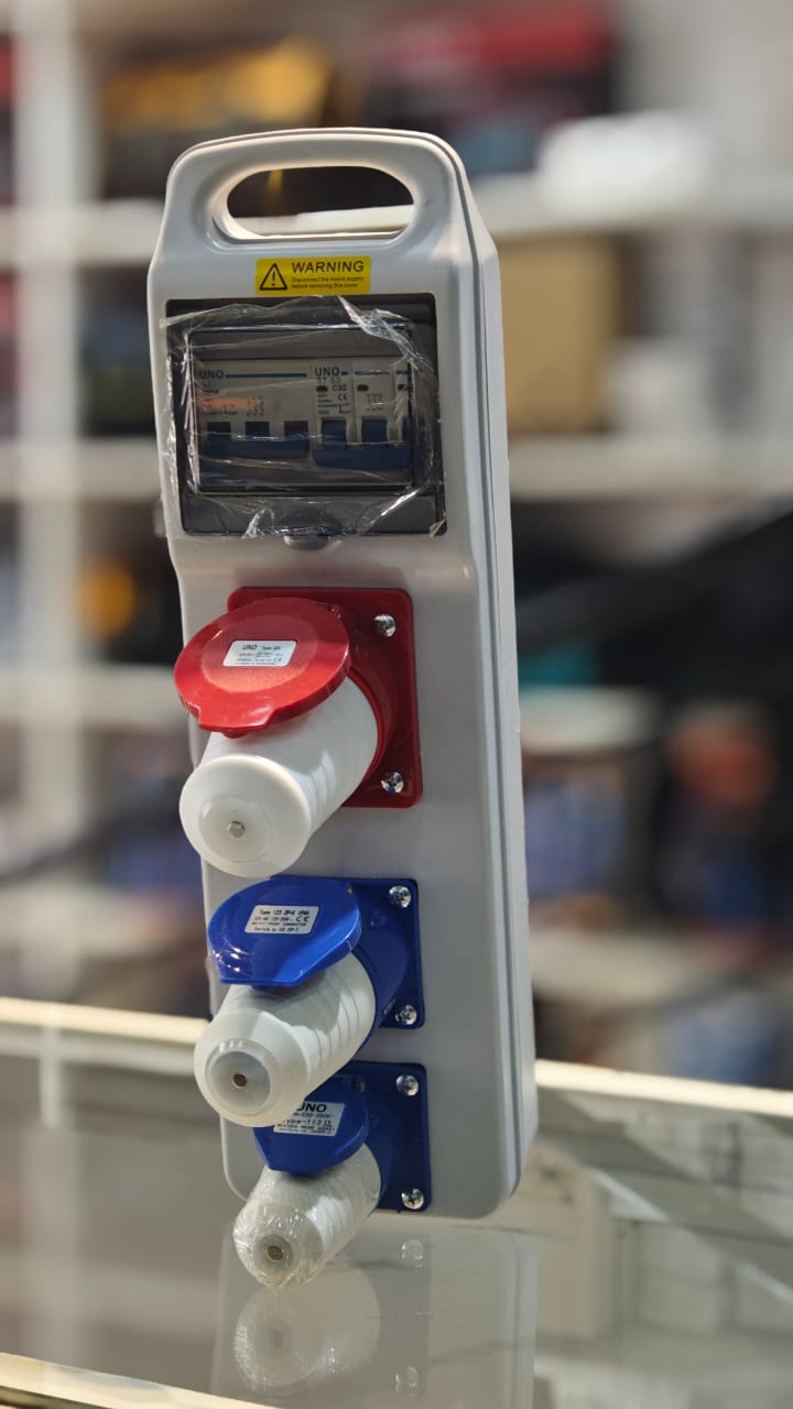 Front view of industrial distribution board with three sockets